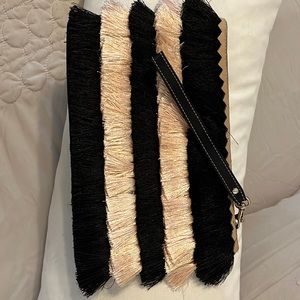 Wristlet by Stella&Dot. Pink and black fringe. Pink Floral interior.